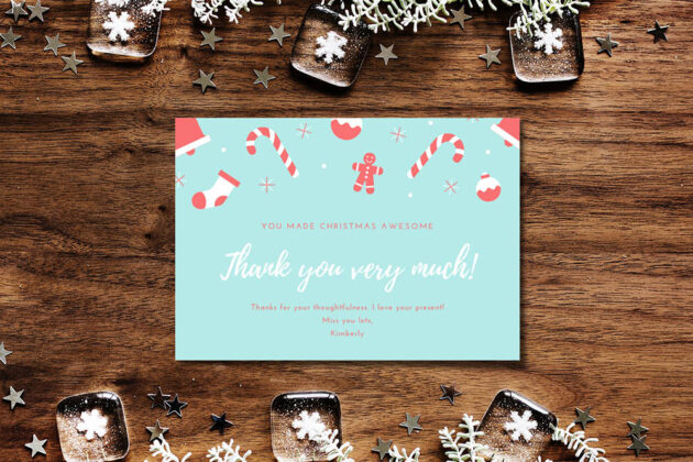 christmas-greeting-card-mockup-generator-on-wood-desk