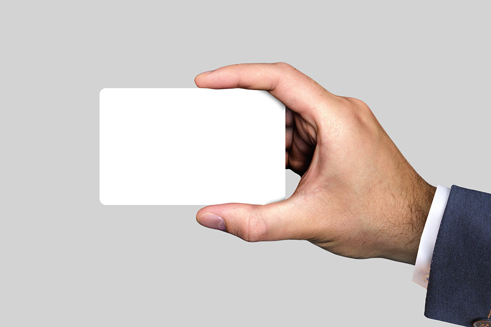 07-man-holding-credit-card-mockup
