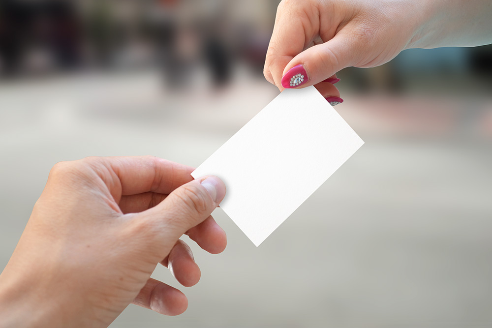 10-holding-business-card-mockup