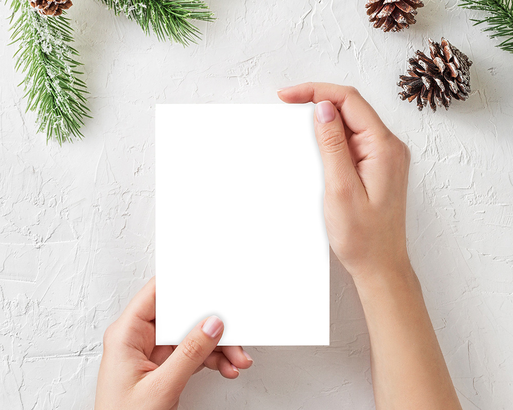 10-woman-holding-card-mockup