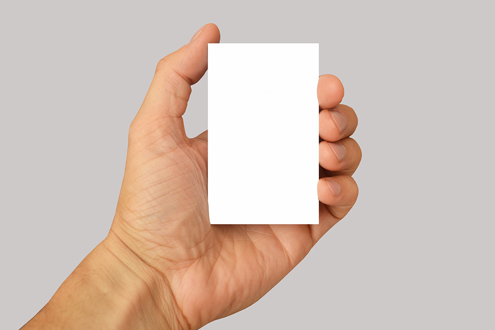 14-man-holding-vertical-business-card-transparent-PNG-mockup