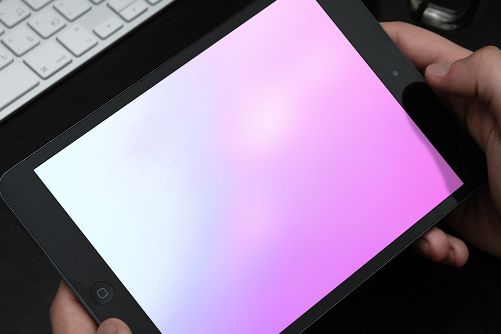 15-closeup-ipad-in-hand-mockup