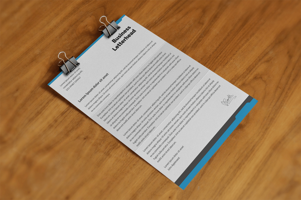21-business-branding-letterhead-mockup-on-wood-desk