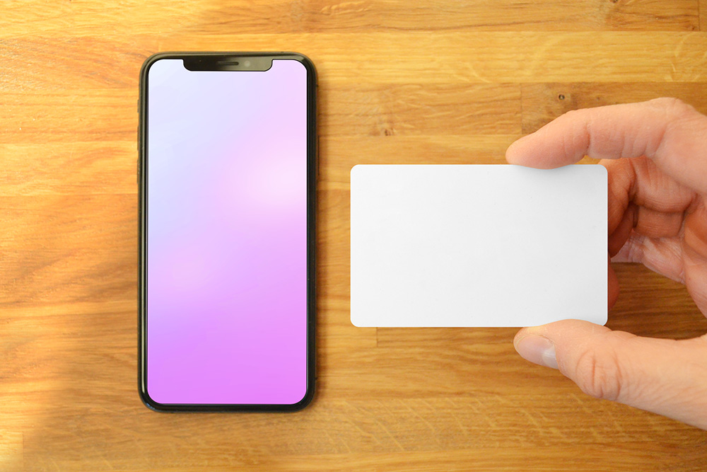 23-iphone-and-hand-holding-credit-card