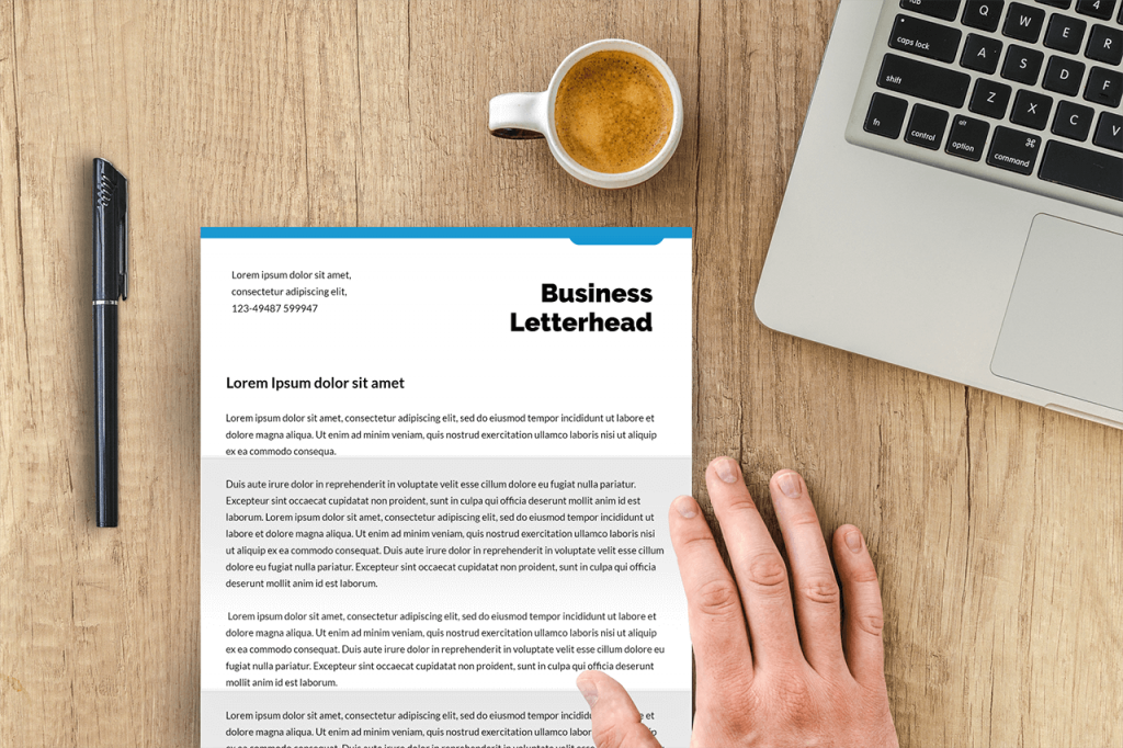 35-business-paper-letterhead-on-desk-mockup-generator